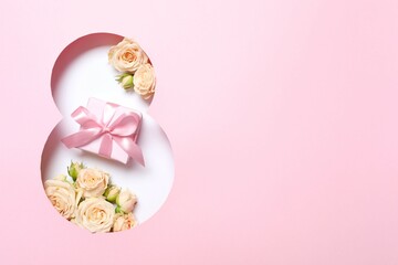 8 March greeting card design with flowers and gift box, top view. Happy International Women's Day