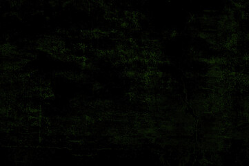 Dark concrete background with copy space. Abstract black green textured background.