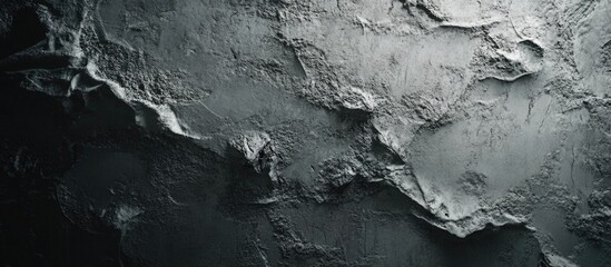 Concrete wall texture featuring a rough, uneven surface ideal for background use in various design projects.