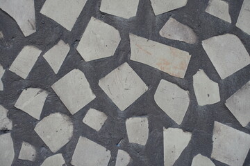 Macro of old pale beige mosaic wall