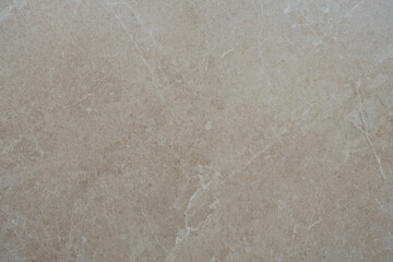 Closeup of light beige artificial stone tiles
