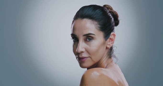 Salon, beauty and skincare with face of woman for dermatology, anti aging and collagen. Spa, wrinkle treatment and self care with mature person on studio background for glow and natural cosmetics