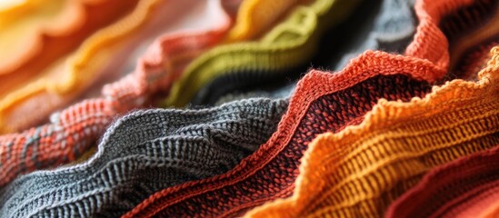 Colorful machine knitted fabric textures showcasing intricate patterns and varied stitches ideal for textile design projects.