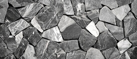 Granite and marble textured background with a geometric rock floor pattern ideal for text overlay and design projects in monochrome tones