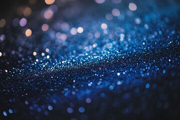 Shimmering Blue Glitter Texture with Bokeh Light Effects on Dark Background
