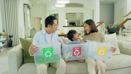 family recycle trash education.Asian family with her little son sorting garbage in recycle bins at home. - Powered by Adobe