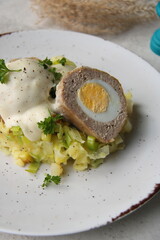 meatball egg and cheesy sauce