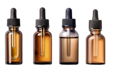 A variety of essential oil dropper bottles in different colors and sizes.