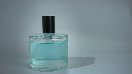 bottle of perfume on white background