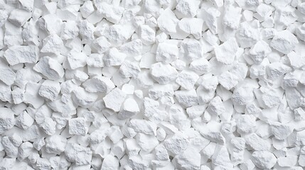 The image displays a textured surface of crushed white stones, creating a visually appealing and uniform backdrop.