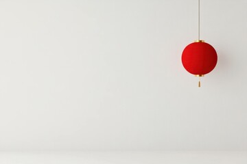 Obraz premium Red decorative lantern hanging against a minimalistic white background, symbolizing celebration and culture, perfect for seasonal events and festivities