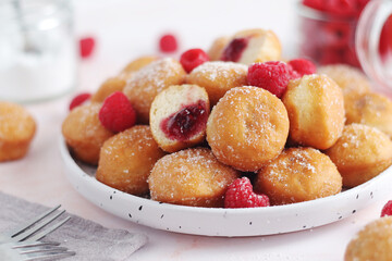 A plate wit traditional berliner cakes with jelly	
