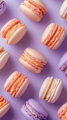 Obraz premium Bright flatlay of colorful macarons on a vibrant background.