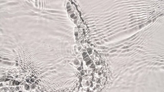 Water texture with waves. Organic shadow effect with wave refraction of light. Slow motion . High quality 4k footage