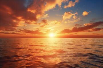 Obraz premium Orange Sunrise over a Beautiful Seascape: Captivating Sunlight with a Touch of Cloud and Sea