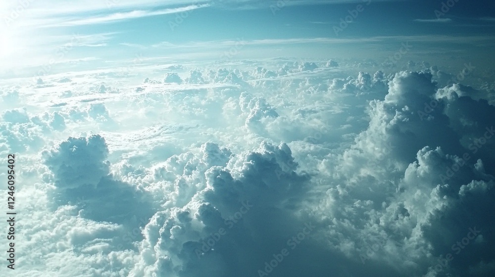 Poster fluffy clouds fill the sky, gently illuminated by radiant sunlight filtering through. the tranquil h