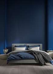 Minimalist bedroom with a blue wall. white bed linens. and a gray blanket
