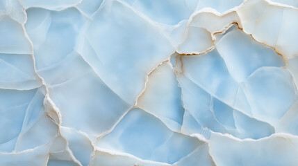 A beautiful close-up of translucent blue onyx stone with intricate natural patterns and delicate cracks.
