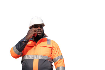 Engineers wearing safety gear, including hard hats examining survey standing industrial facility engaged in a job requires high safety standards concept with PNG white background.	