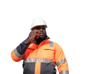 Engineers wearing safety gear, including hard hats examining survey standing industrial facility engaged in a job requires high safety standards concept with PNG white background.	