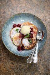 Fluffy Pancakes with Cherries and Ice Cream
