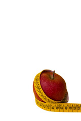 Red apple with white background and measurement centimetres around the fruit 