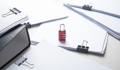 Padlock with a documents. Confidentiality. Protection of information