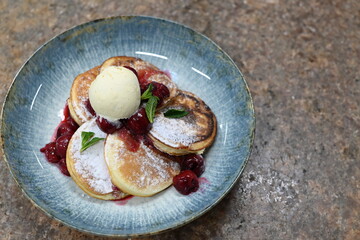 Fluffy Pancakes with Cherries and Ice Cream
