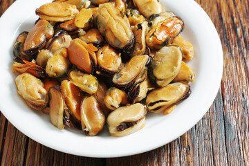 Mussel meat cooked with garlic