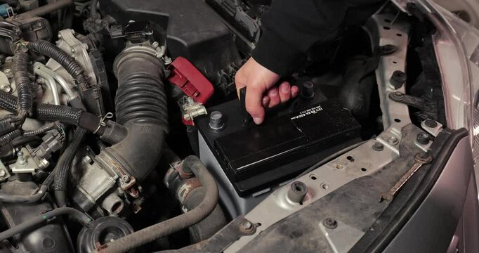 Removing old battery from car