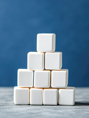 Creative indoor of a white block pyramid on minimalist background