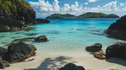 Obraz premium Secluded beach cove, turquoise water, rocky shores.