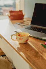 A cup of morning coffee at the workplace