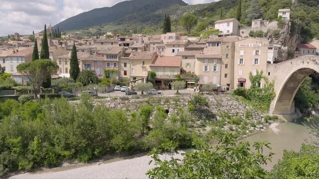 The Romanesque Bridge over the Eygues River, Nyons, Drome, France.
