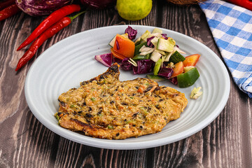 Tasty chicken steak with vegetables