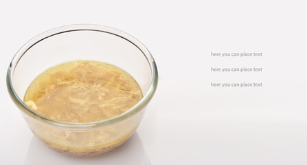 Advertising poster with space for text. Round glassware with galantine on white background, space for text