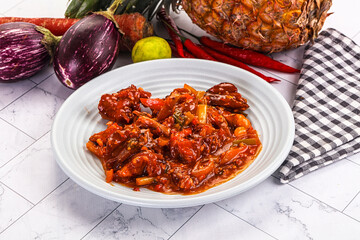 Asian cuisine - pork in chili sauce