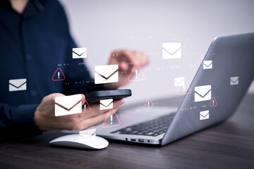 Email concept with laptop spam and virus computer monitor internet security concept, businessman reading electronic mail with a laptop. Spam, junk and e-marketing on screen, Spam Email Pop-up Warning.