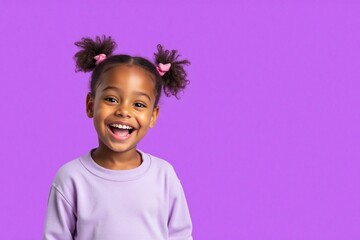 young child with cheerful expression against purple background