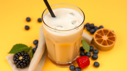 Tasty milk bubble tea in glass on yellow background, space for text. Generative AI