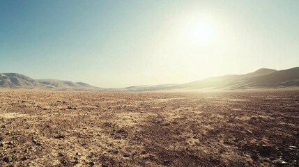 Fototapeta premium Vast Arid Landscape Under Clear Sky with Bright Sunlight