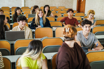 Students inside university class room - Back to school, campus lifestyle and multiracial concept -...