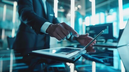 Close-up of a business executive閳ユ獨 hands using a digital notebook to brainstorm with an interactive digital pen in a minimalist office designed for creativity.