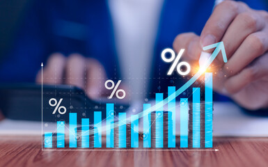 Interest rate and dividend concept, Businessman is calculating income and return on investment in...