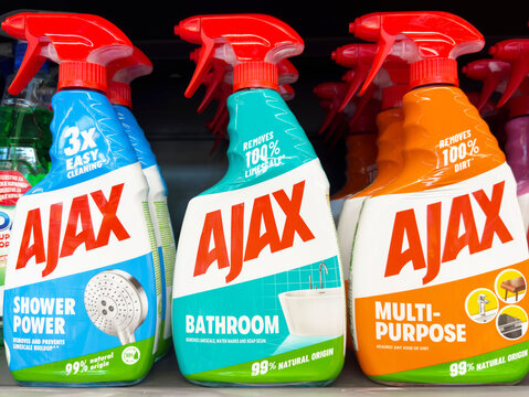 Ajax cleaning products on store shelf: shower power, bathroom, multi-purpose