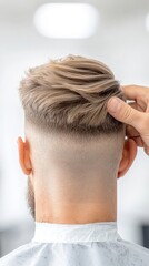 Naklejka premium Modern Hairstyle with Fade Cut in Barber Shop