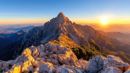 Obraz premium Majestic mountain peak sunset panorama