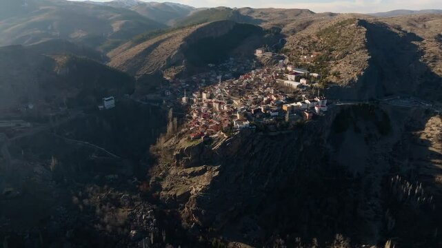 Aerial view from a drone of houses in the city of Tashkent in Turkey on a cliff above a gorge &ndash; epic scenery
