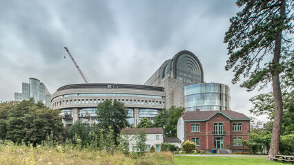 Naklejka premium Buildings in Brussels European Quarter timelapse with the European Parliament