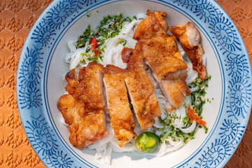top view Thai-style chicken with stir-fried Ho Fun or rice noodles at horizontal composition